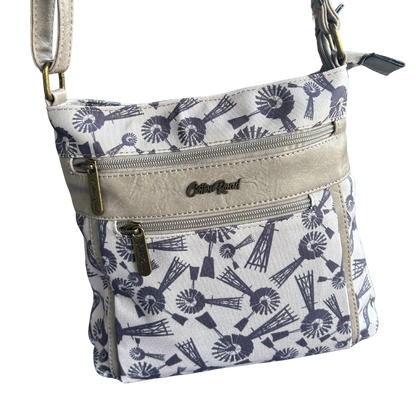 Cotton Road Sling Bag: BEIGE WINDMILL PRINT Canvas with PU Leather Trim BAG front view