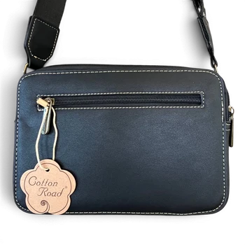 Cotton Road Sling Bag: BLACK PU Leather Crossbody with EMBOSSED Design branded back view