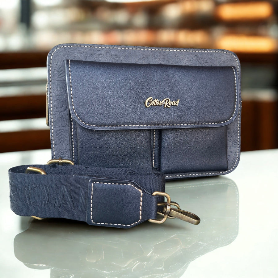 Cotton Road Sling Bag: BLACK PU Leather Crossbody with Embossed Flowers and BRANDED STRAP hero