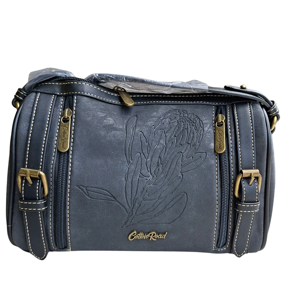 Cotton Road Sling Bag: BLACK PU Leather with Embossed PROTEA and BRANDED Strap BACK