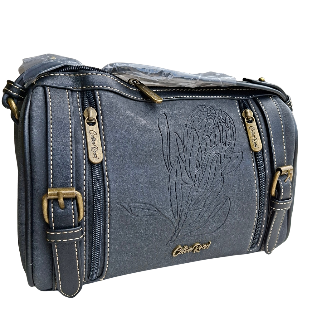 Cotton Road Sling Bag: BLACK PU Leather with Embossed PROTEA and BRANDED Strap FULL