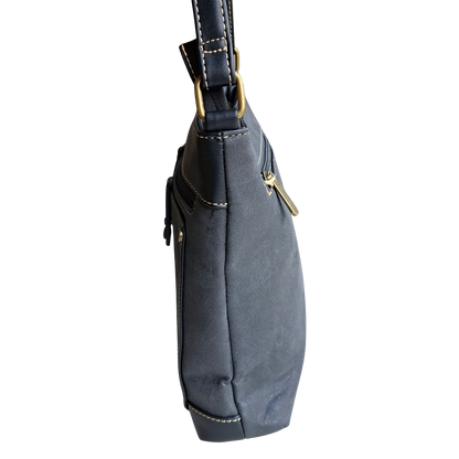 Cotton Road Sling Bag: BLACK PU Leather with Embossed Protea side view