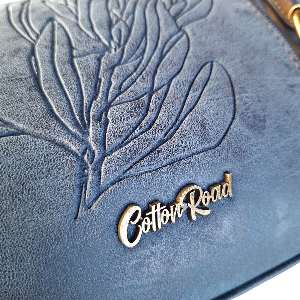 Cotton Road Sling Bag: BLUE PU Leather with Embossed PROTEA and BRANDED Strap BRANDING DETAIL
