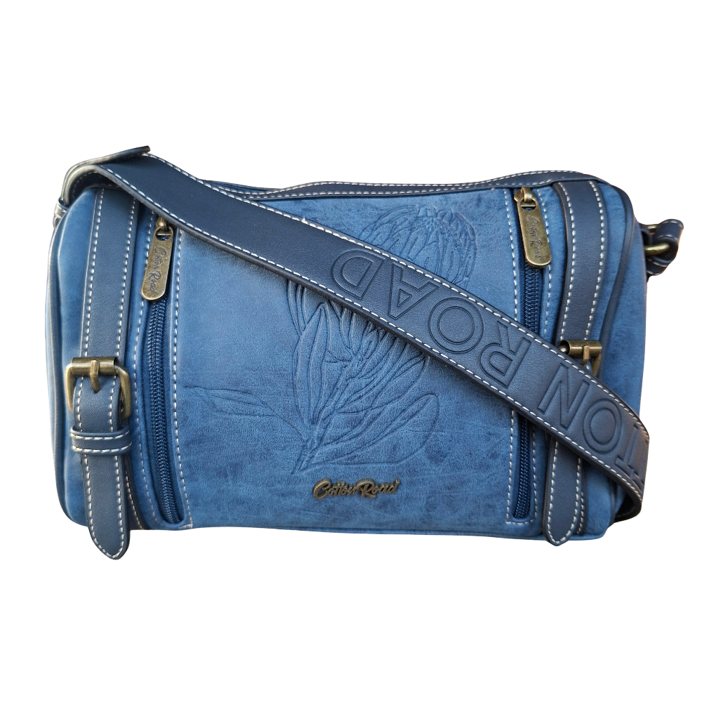 Cotton Road Sling Bag: BLUE PU Leather with Embossed PROTEA and BRANDED Strap FRONT