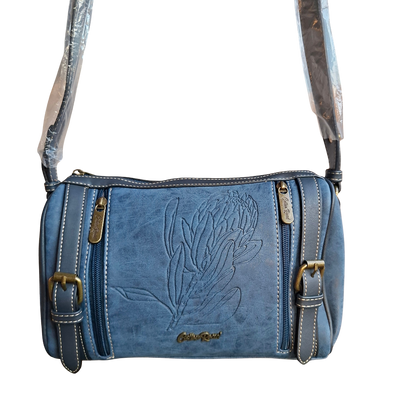 Cotton Road Sling Bag: BLUE PU Leather with Embossed PROTEA and BRANDED Strap HANGING