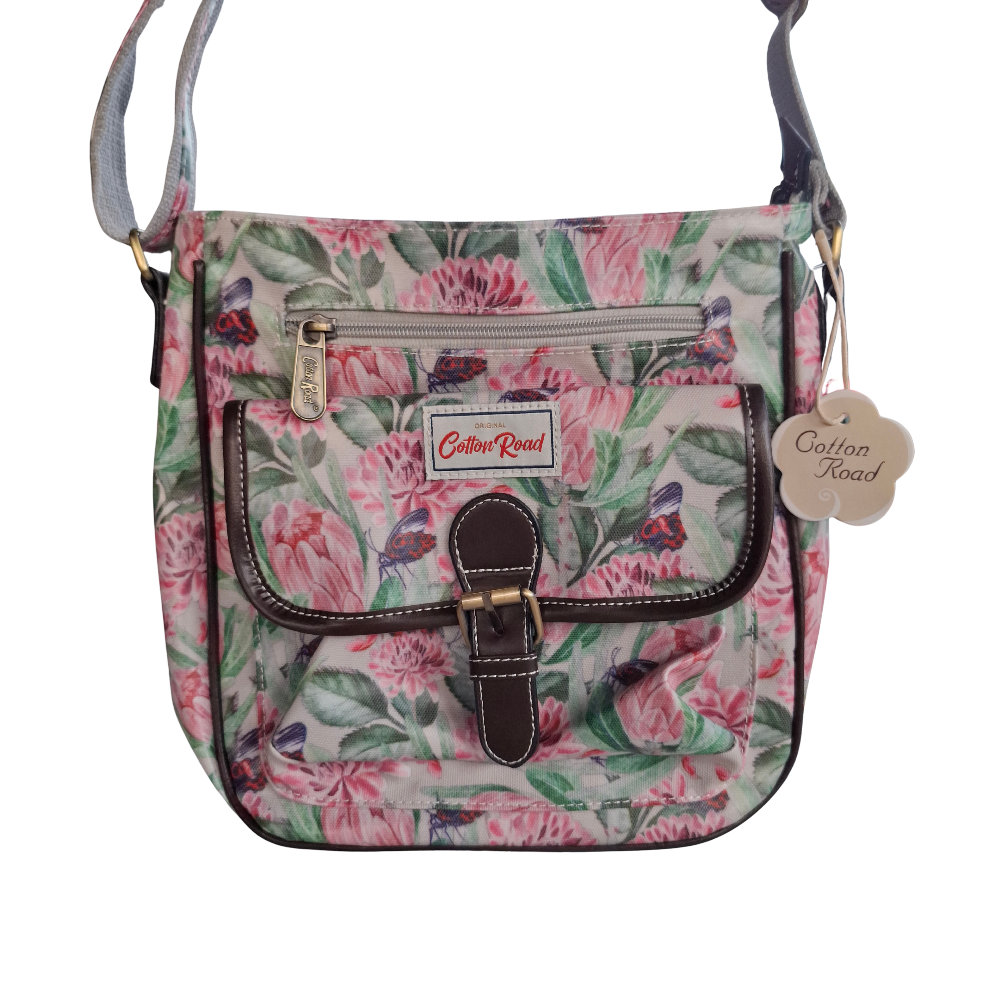 Cotton Road Sling Bag: GREEN PVC Crossbody with PINK PROTEA Print FRONT