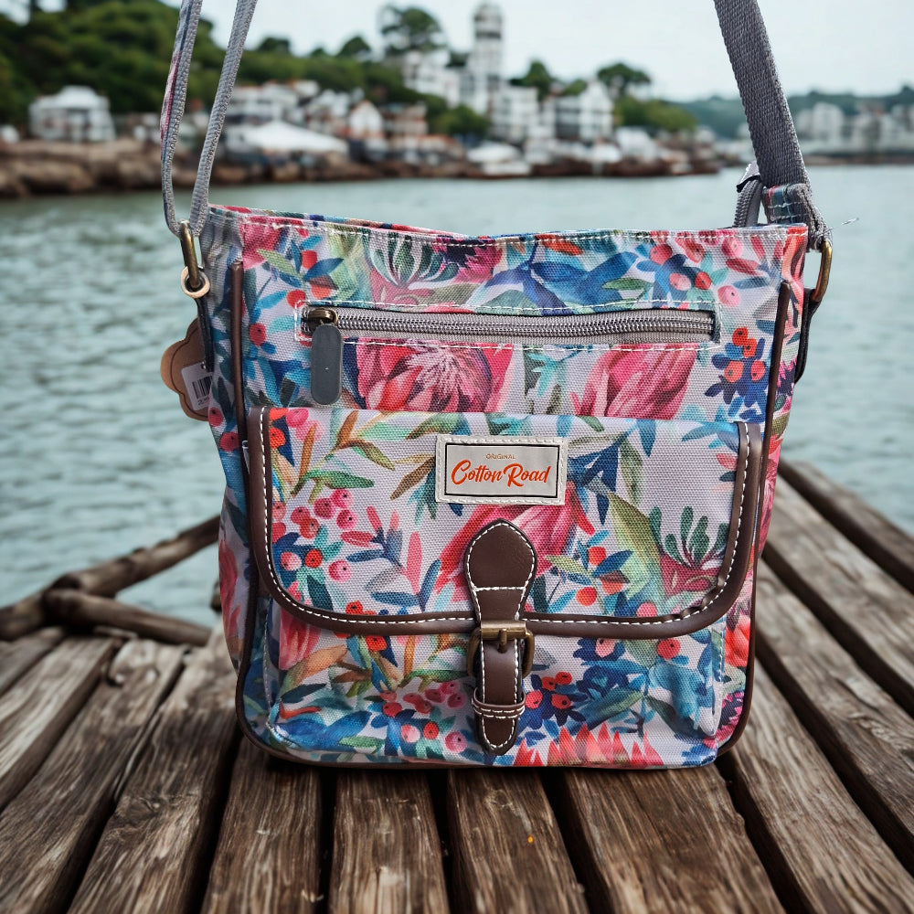Cotton Road Sling Bag: GREY PVC with Colorful Protea Floral Print HERO
