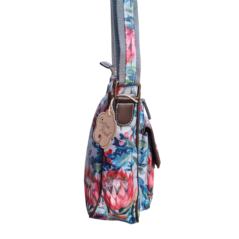 Cotton Road Sling Bag: GREY PVC with Colorful Protea Floral Print SIDE