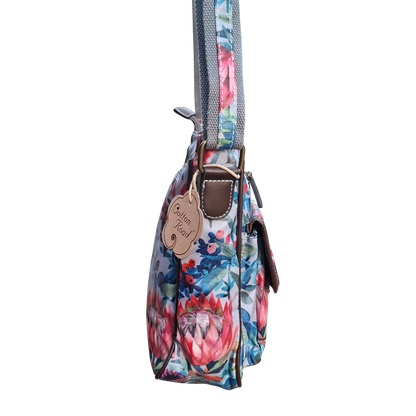 Cotton Road Sling Bag: GREY PVC with Colorful Protea Floral Print SIDE