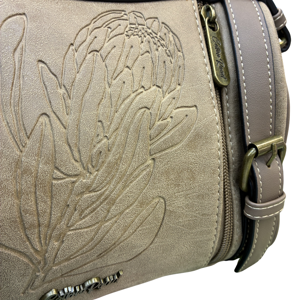 Cotton Road Sling Bag: KHAKI PU Leather with Embossed Protea and BRANDED Strap DETAIL