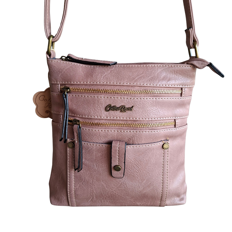 Cotton Road Sling Bag: PINK PU Leather with Metal Zips FRONT
