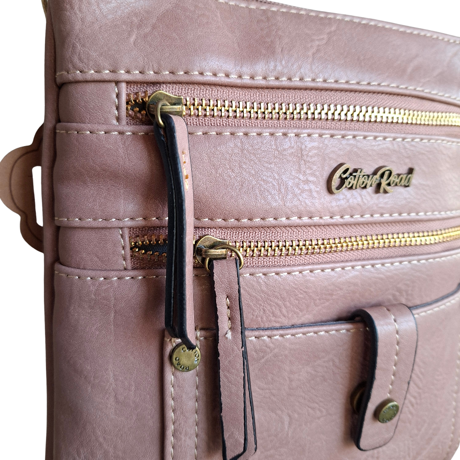 Cotton Road Sling Bag: PINK PU Leather with Metal Zips FRONT ZOOM