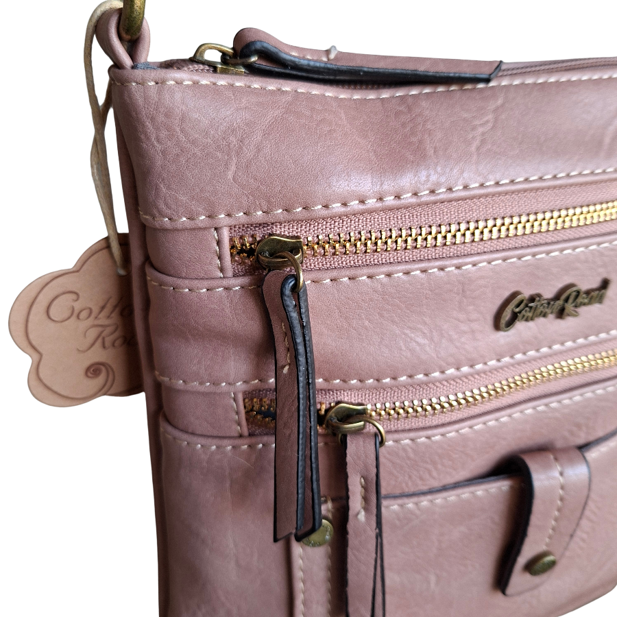 Cotton Road Sling Bag: PINK PU Leather with Metal Zips FRONT ZOOM VIEW