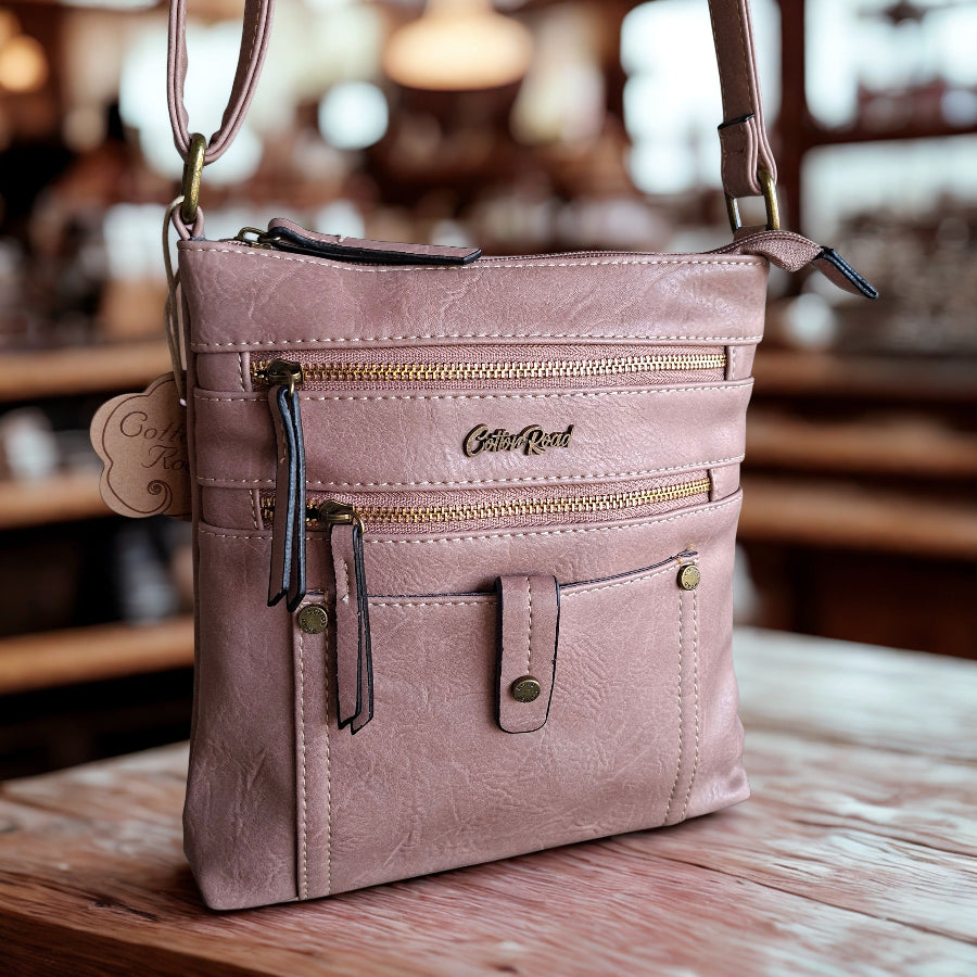 Cotton Road Sling Bag: PINK PU Leather with Metal Zips HERO