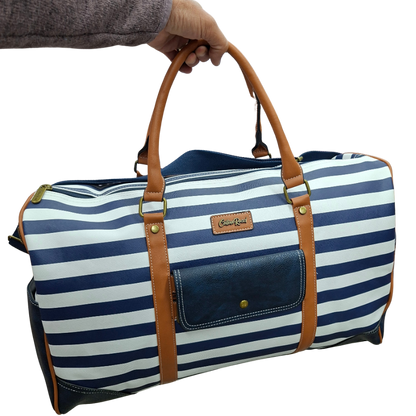 Cotton Road Travel Bag: Navy Blue & White Stripes PVC Weekend / Overnight Bag with Tan Trim FRONT VIEW IN HAND