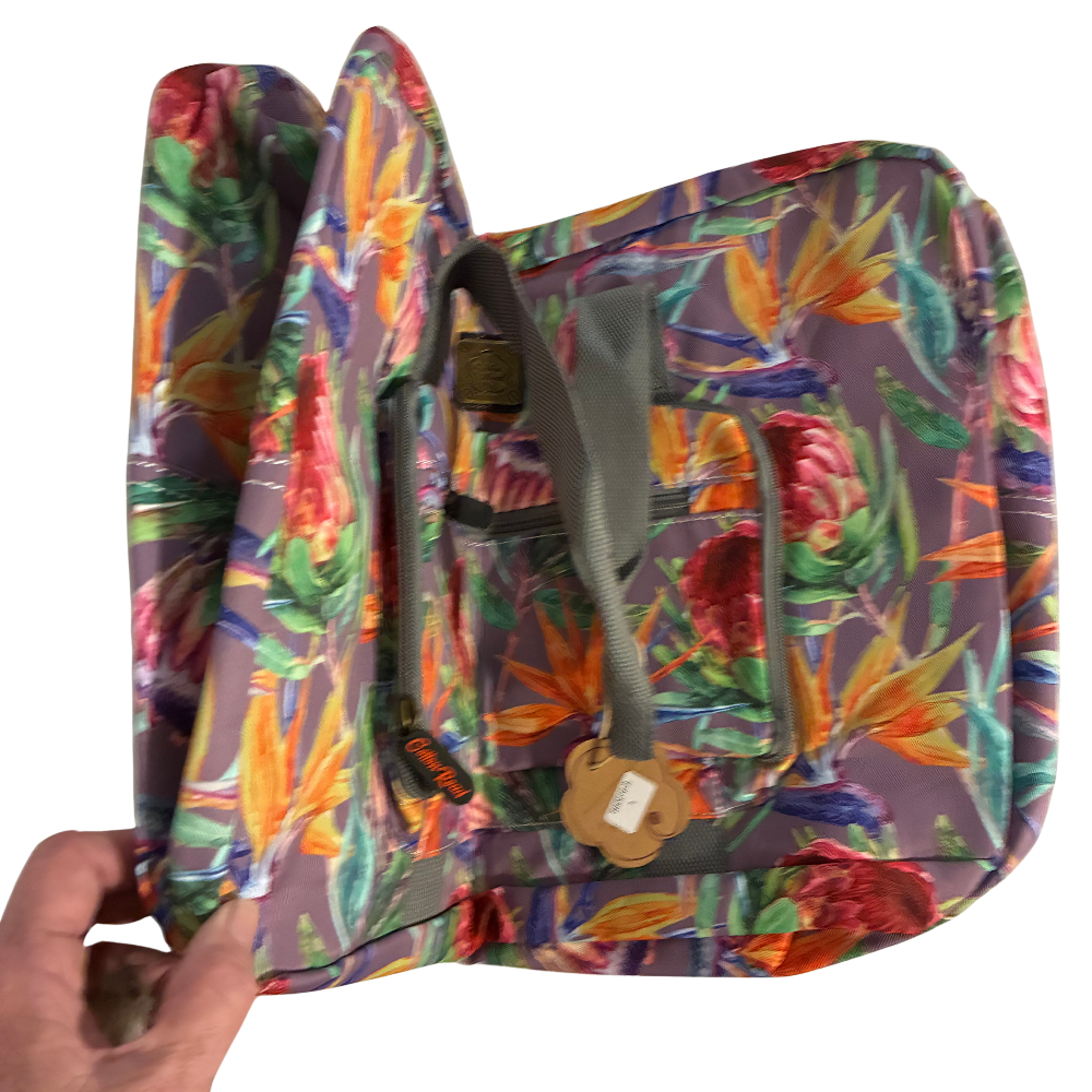Cotton Road Travel Bag: Purple Soft Linen Overnight Bag with Colourfull Protea detailing unfolding