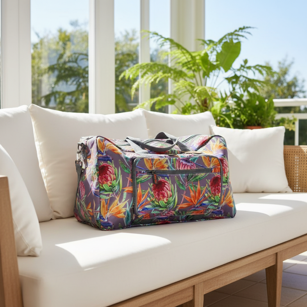 Cotton Road Travel Bag: Purple Soft Overnight Bag with Colourfull Protea detailing LIFESTYLE
