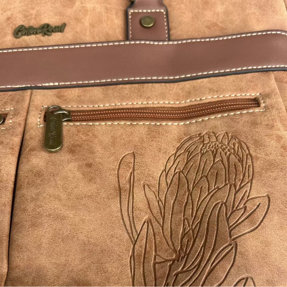 Cotton Road Laptop Bag: BROWN PU Leather with Embossed Protea