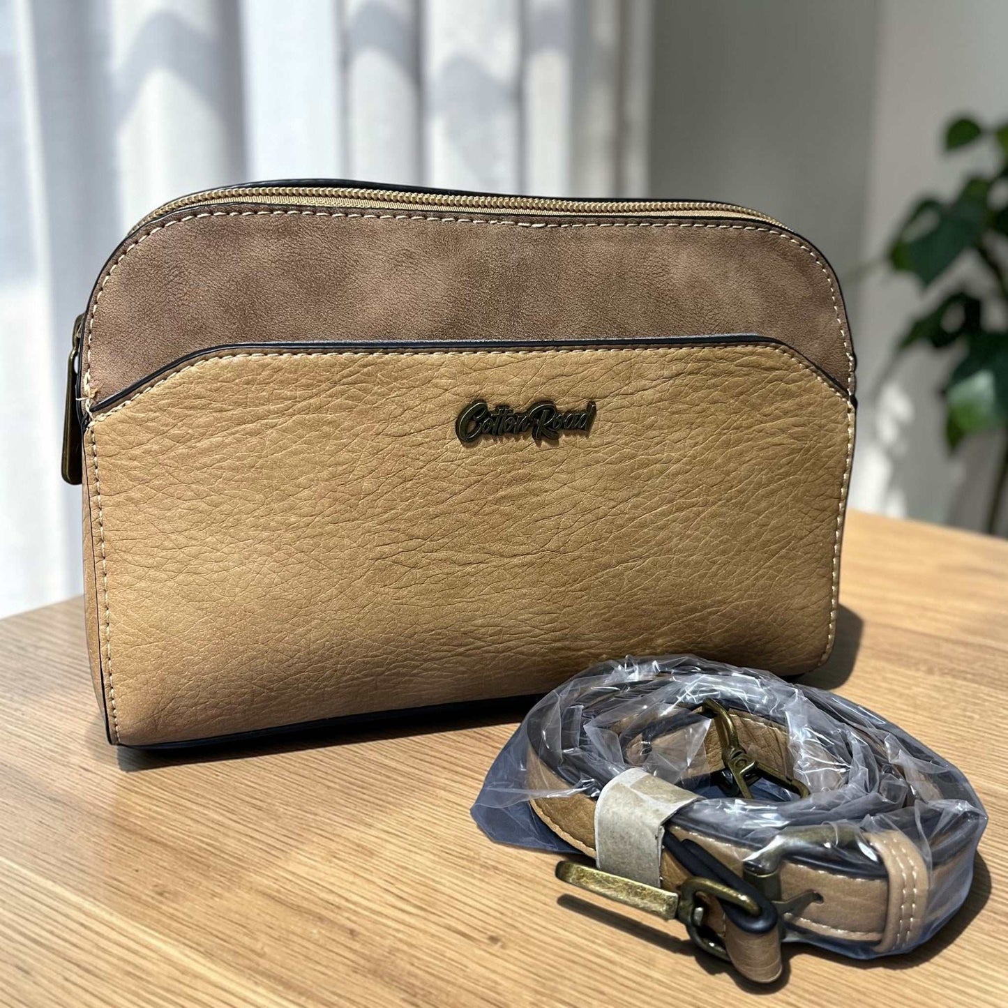 Khaki Cotton Road Sling Bag with adjustable strap and multiple zippered compartments
