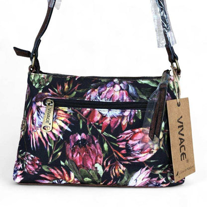 VIVACE Sling Bag: BLACK Canvas with PROTEA Print and BROWN PU Leather TRIM REAR VIEW