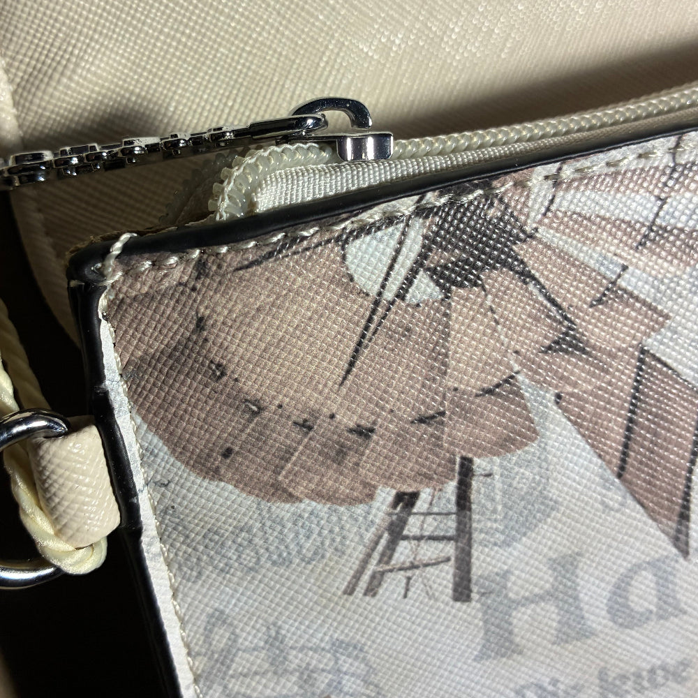 VIVACE CLUTCH BAG: BEIGE FAUX Leather SLING BAG with BROWN WINDMILL Print DETAIL