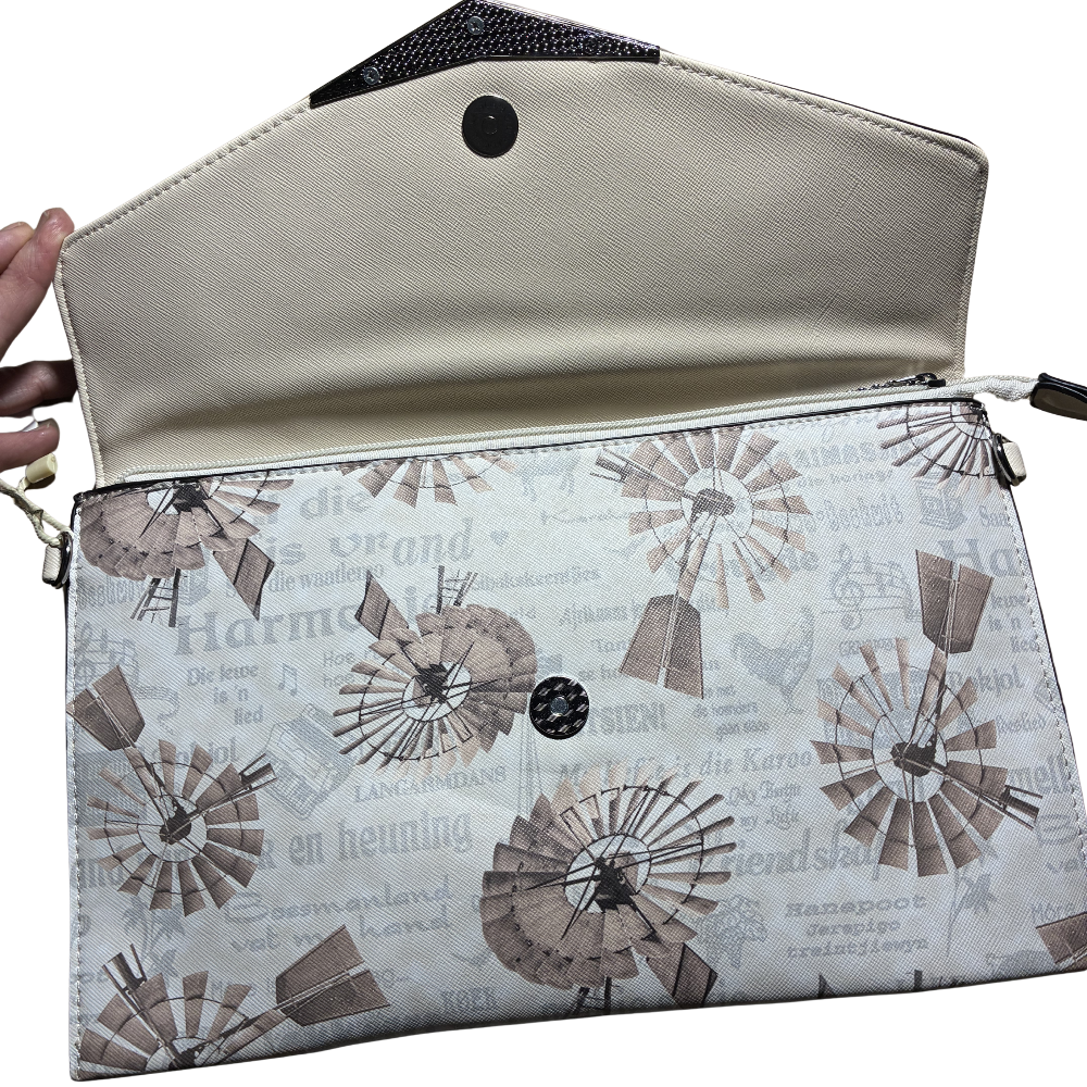 VIVACE CLUTCH BAG: BEIGE FAUX Leather SLING BAG with BROWN WINDMILL Print SIDE FLAP OPEN