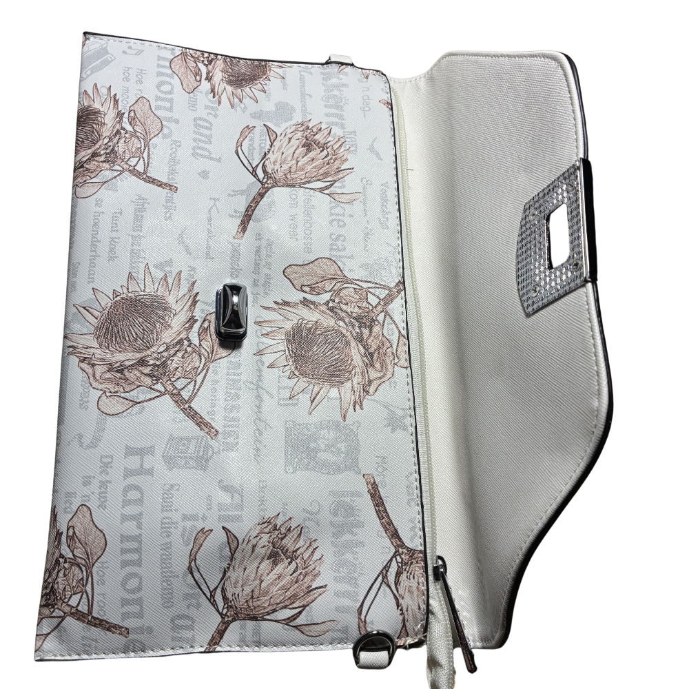VIVACE CLUTCH BAG: WHITE FAUX Leather SLING BAG with BROWN PROTEA Print FLAP OPEN VIEW
