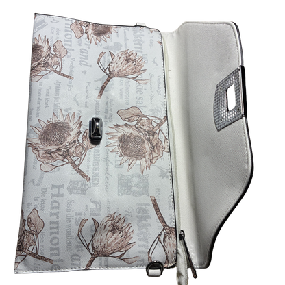 VIVACE CLUTCH BAG: WHITE FAUX Leather SLING BAG with BROWN PROTEA Print FLAP OPEN VIEW