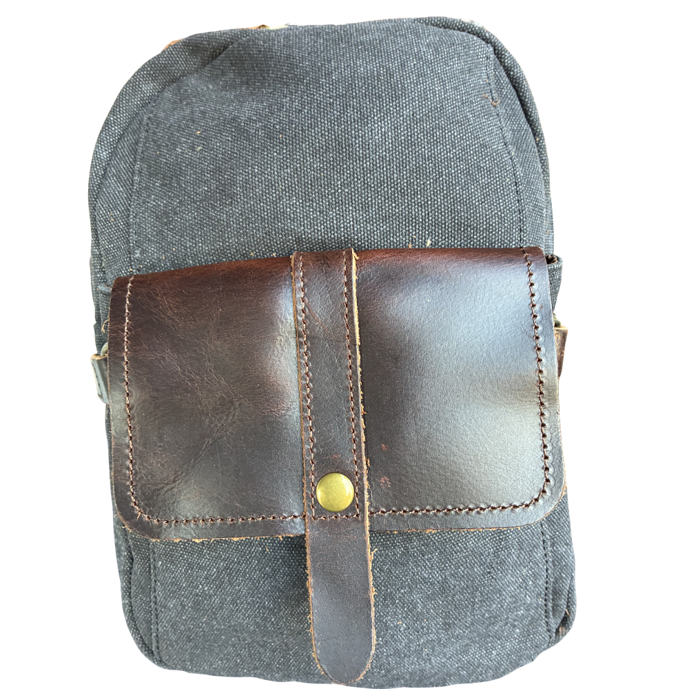 VIVACE CROSS BODY BAG: VINTAGE CHARCOAL BLACK Canvas with Detailed Leather Trim NEAR SHOULDER STRAP FRONT DETAIL