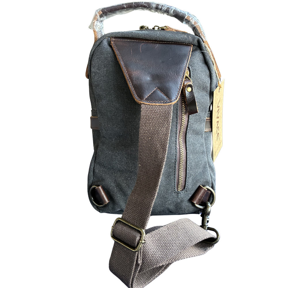 VIVACE CROSS BODY BAG: VINTAGE CHARCOAL BLACK Canvas with Detailed Leather Trim NEAR SHOULDER STRAP VIEW