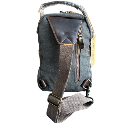 VIVACE CROSS BODY BAG: VINTAGE CHARCOAL BLACK Canvas with Detailed Leather Trim NEAR SHOULDER STRAP VIEW