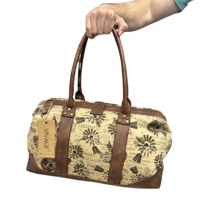 VIVACE TRAVEL BAG: BEIGE CANVAS AND LEATHER OVERNIGHT BAG WITH WINDMILLS IN HAND