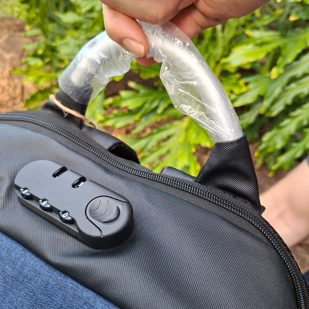 Vivace TRAVEL BACKPACK/ LAPTOP BAG  - TOP CARRY HANDLE IN SILVER AND COMBINATION LOCK VISIBLE