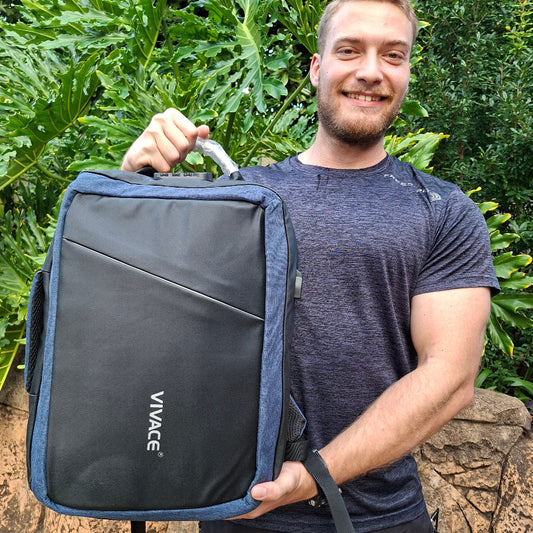 Vivace blue medium backpack front view HELD BY HUMAN