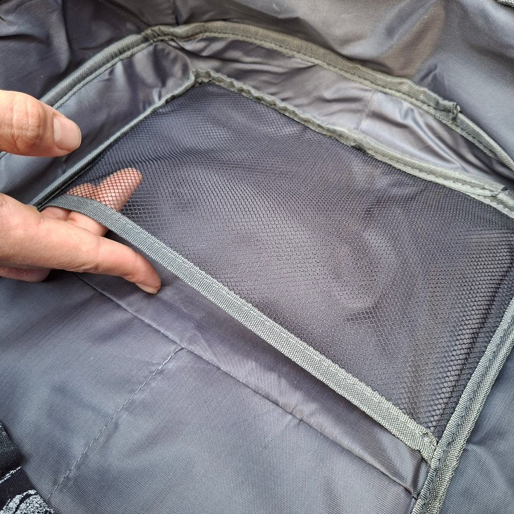 View of mesh side panel pocket inside Vivace Backpack