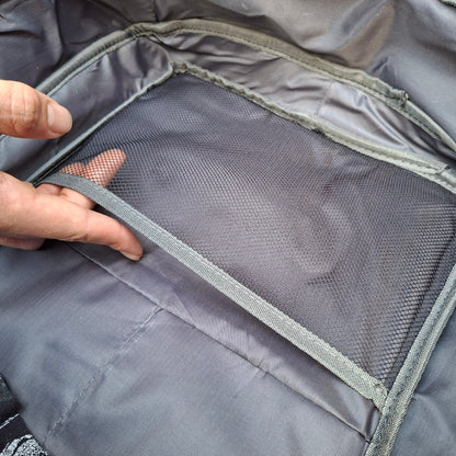 View of mesh side panel pocket inside Vivace Backpack