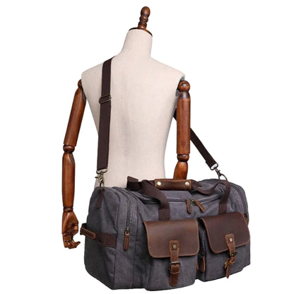 Vivace Travel Bag: Charcoal BLACK Canvas Duffel with Genuine Leather Trim on mannequin