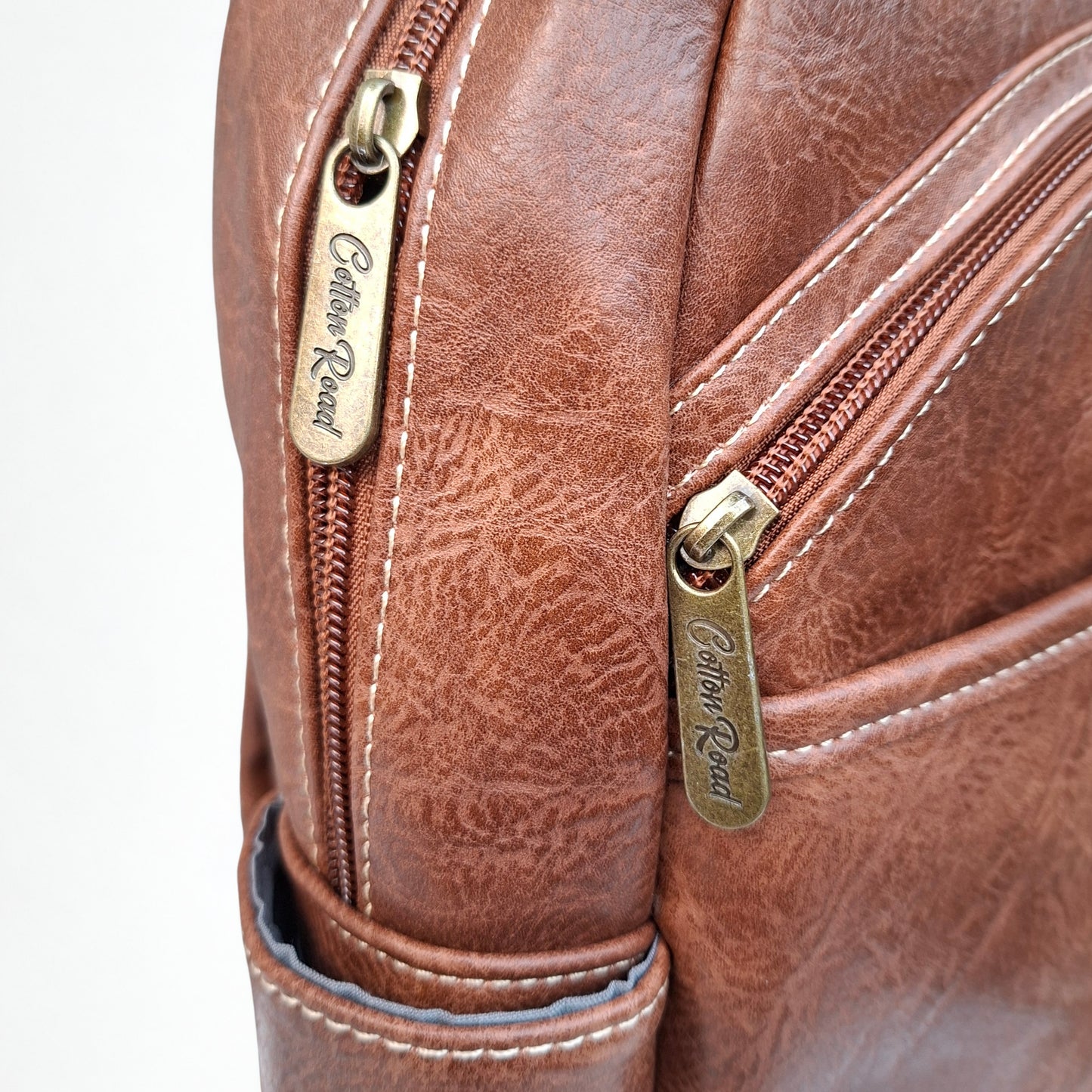 Cotton Road Backpack: BROWN PU Leather Laptop Backpack with Embossed flower stitching zipped