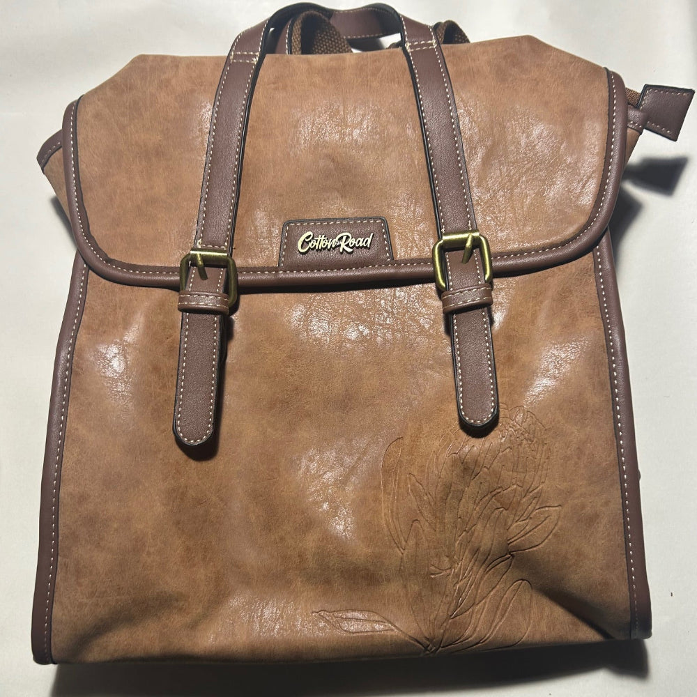 COTTON ROAD BACKPACK: BROWN PU Leather backpack with Embossed Proteas FRONT