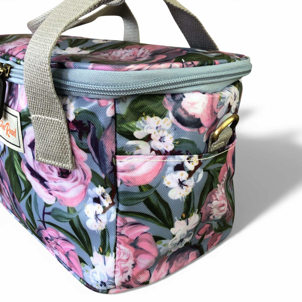 Blue PVC Cotton Road Cooler lunch box bag with purple pink floral design and insulated thermal lining