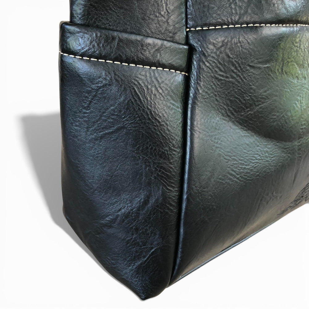 Cotton Road black PU leather handbag close up view
