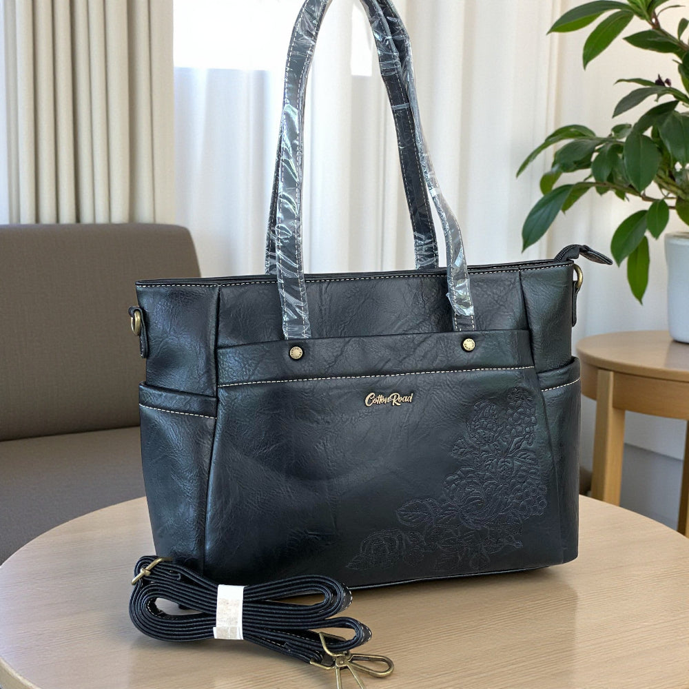 Cotton Road black PU leather handbag front view on table