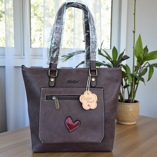 Cotton Road brown PU leather handbag front view on tabe