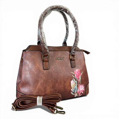 Brown PU Leather Cotton Road Handbag with Protea detailing and dual handles