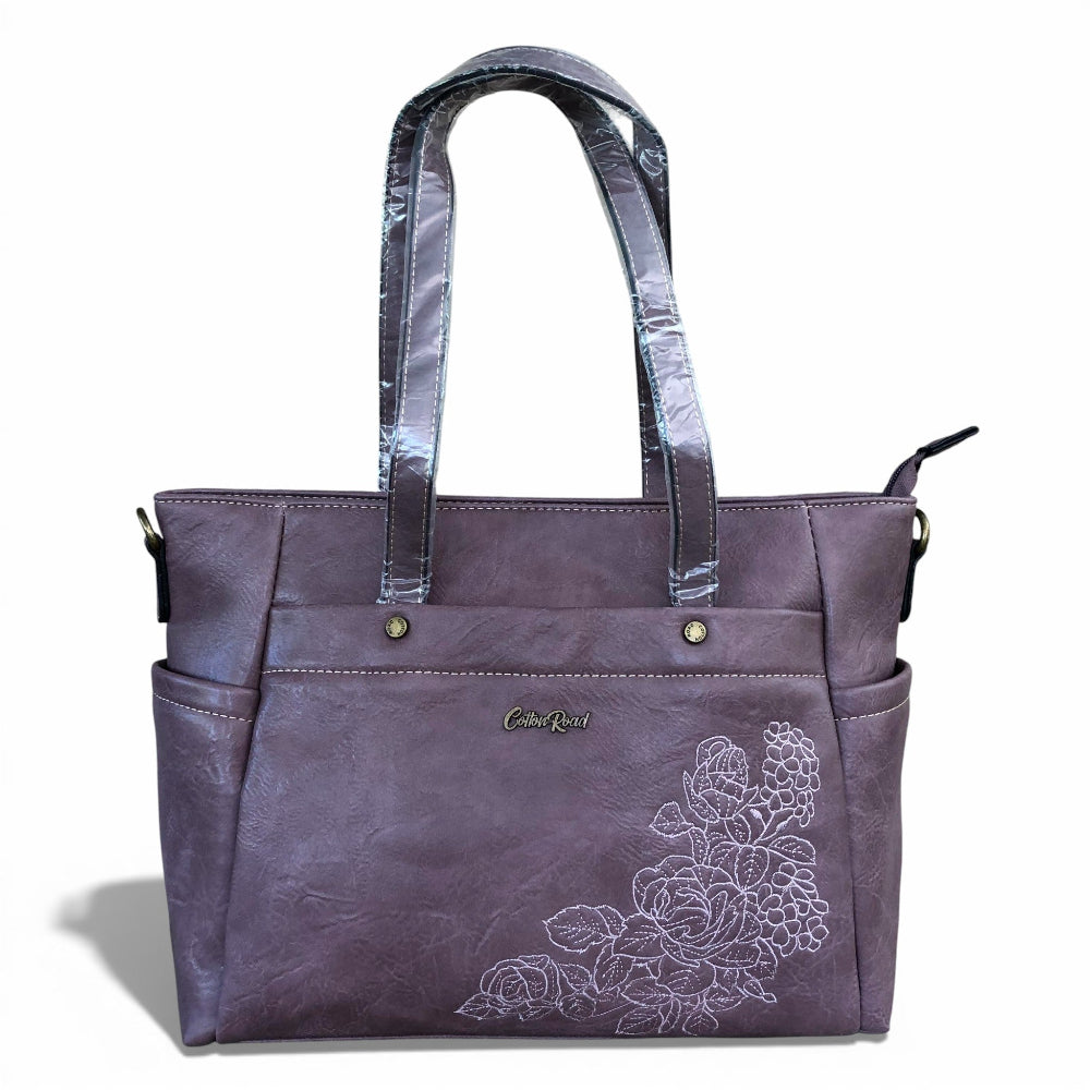 Cotton Road Purple PU leather handbag with floral embroidery on a white background