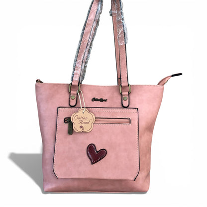 Cotton Road salmon pink PU leather handbag front view on white background