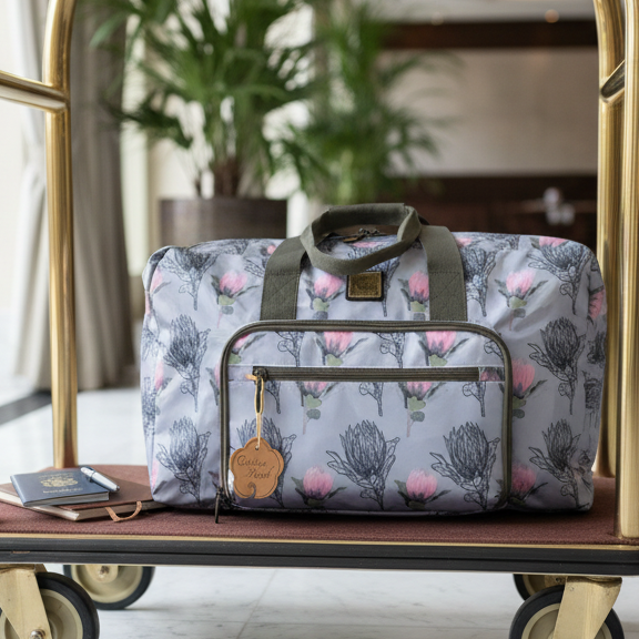 Cotton Road Travel Bag: Blue PVC Foldaway WEEKENDER Bag with PROTEAS