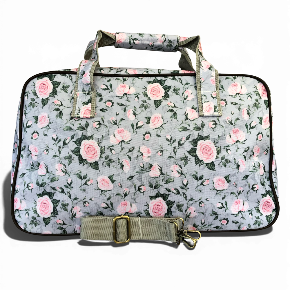 Grey Cotton Road travel bag with pink rose design and matching vanity bag