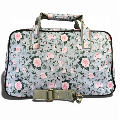 Grey Cotton Road travel bag with pink rose design and matching vanity bag