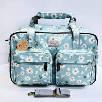 Cotton Road Travel Bag: LIGHT BLUE/ GREEN PVC Overnight Bag with DAISIES